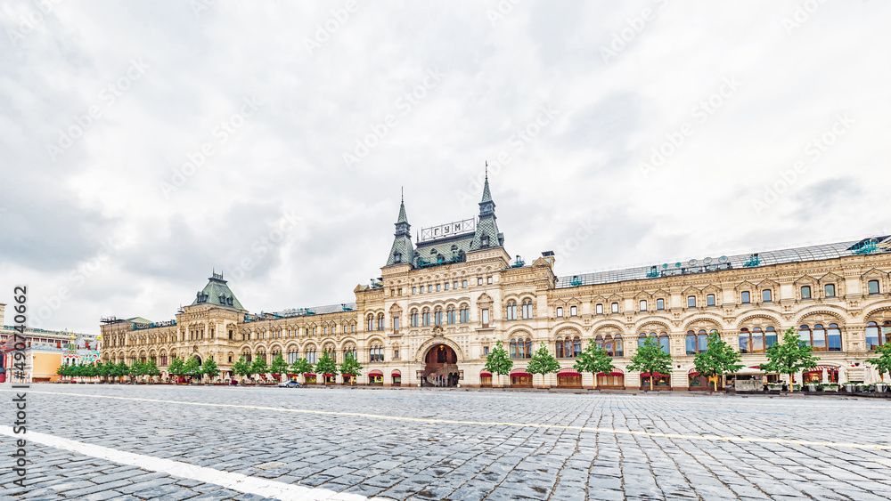 Panoramic photo of the GUM building on deserted Red Square in Moscow, Russia. Translation of the caption in Russian: GUM
