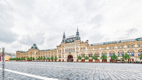 Panoramic photo of the GUM building on deserted Red Square in Moscow, Russia. Translation of the caption in Russian: GUM