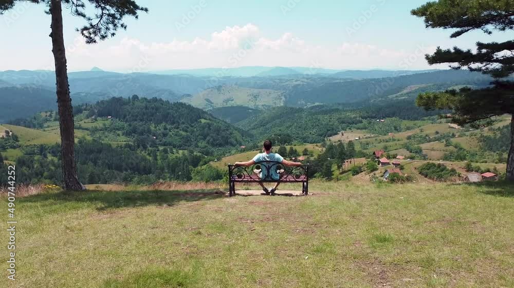 Bench for couples in love with a beautiful view of the hills and mountains on a sunny summer day 16 Bench for couples in love with a beautiful view of the hills and mountains on a sunny summer day 16