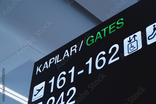 Close up shot of airport gates information board