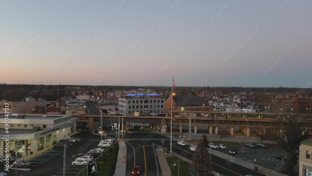 Aerial View of an American Flag Waving at Train Station Aerial View of an American Flag Waving at Train Station