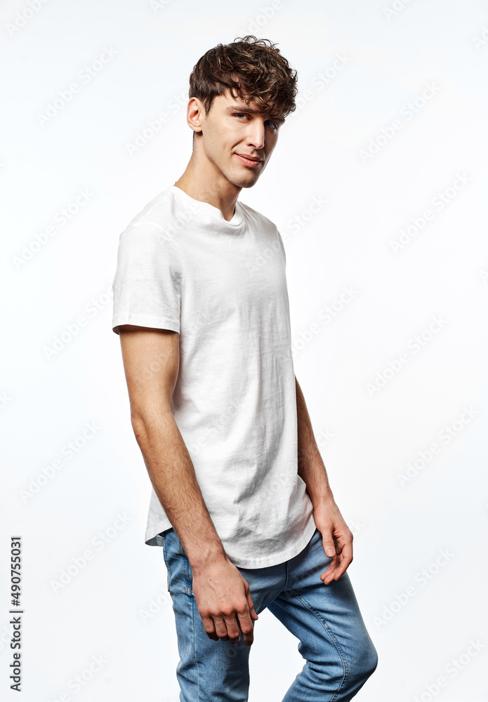 Portrait of handsome man in white t-shirt isolated on white background