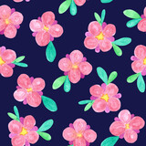 Seamless pattern made of pink flowers on a dark blue background