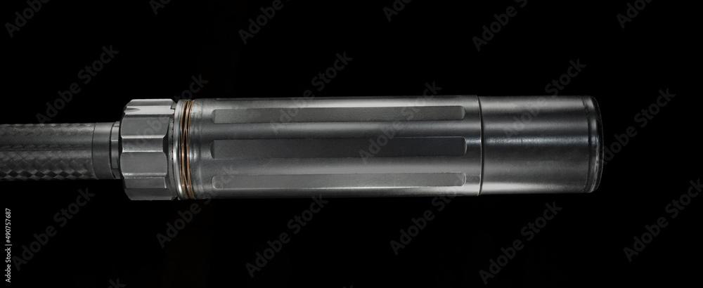 Side view of a silencer on black