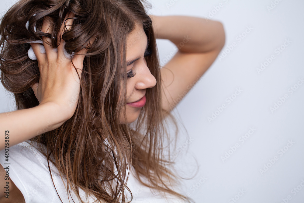Happy young woman with wet hair in bathroom Happy young woman with wet hair in bathroom