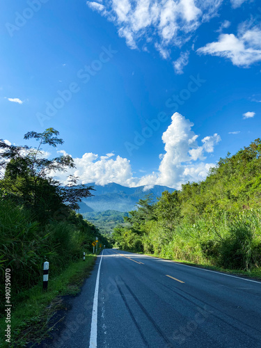 Green Mountains Road and Blue Sky. Nan, Thailand.
