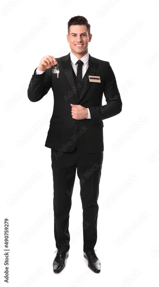 Happy receptionist in uniform holding key on white background Happy receptionist in uniform holding key on white background