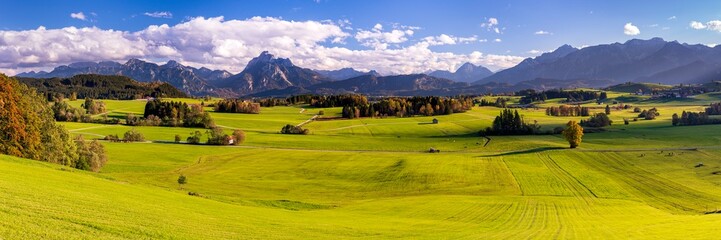 Leinwandbilder Honigfarbe panoramic landscape in Bavaria with mountain range and lake  © Wolfilser