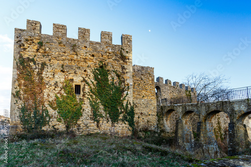 Old crenelated stone fortress photo