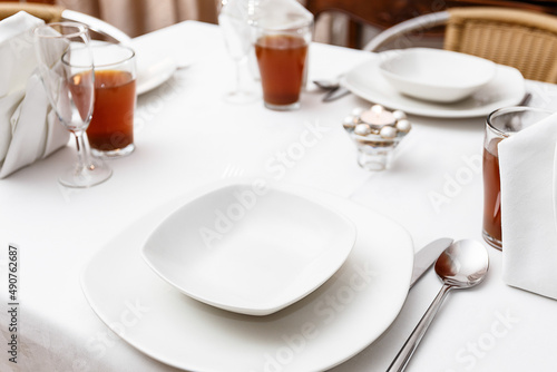 Simple white formal table setting