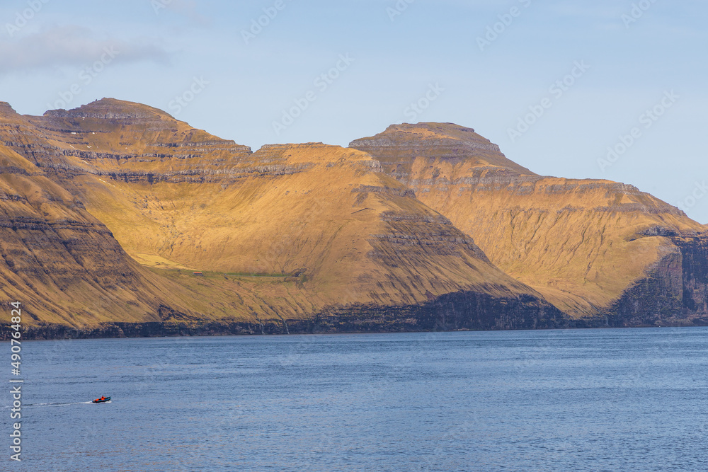 Steep coast of the islands of Kunoy and Kalsoy. Faroe Islands.