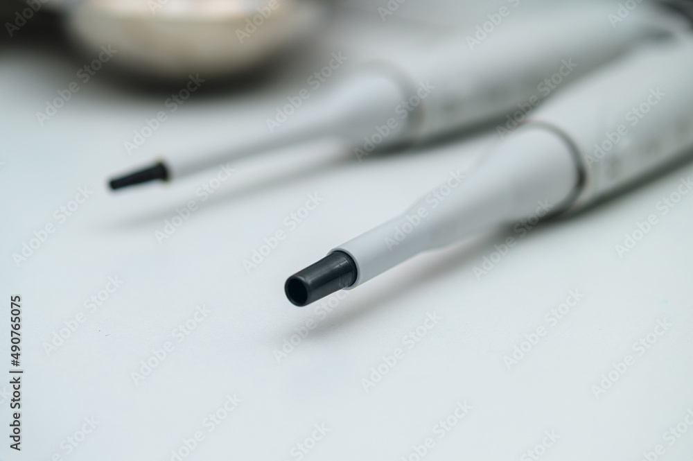 Research in the laboratory. Use of an electronic pipette in research Research in the laboratory. Use of an electronic pipette in research