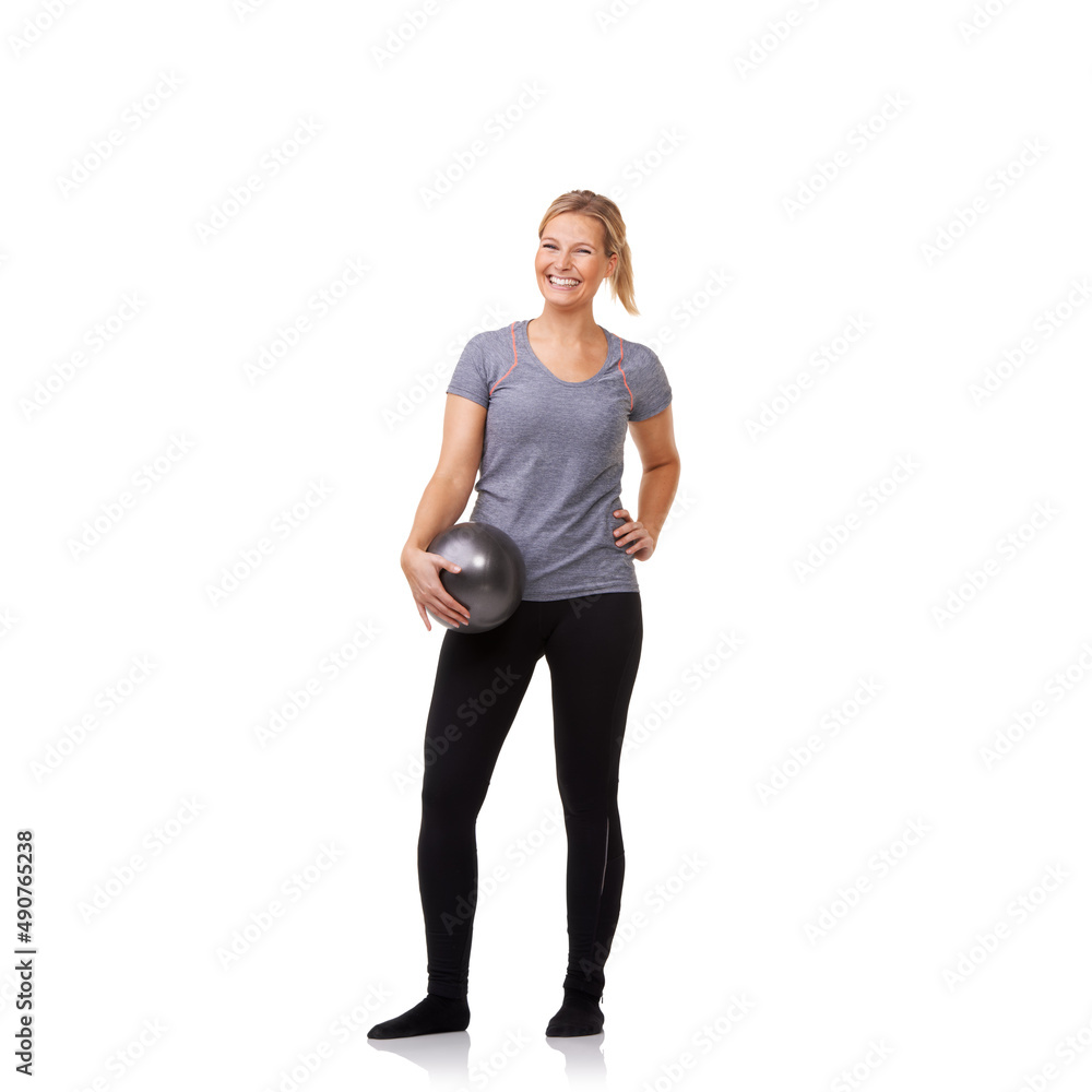 Wow This ball made all the difference. A pretty young blonde holding an exercise ball after an invigorating workout. Wow This ball made all the difference. A pretty young blonde holding an exercise ball after an invigorating workout.