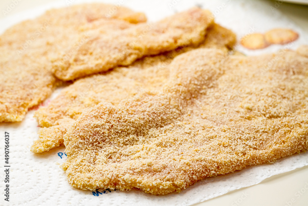 Breaded slices of thin meat in a schnitzel Breaded slices of thin meat in a schnitzel