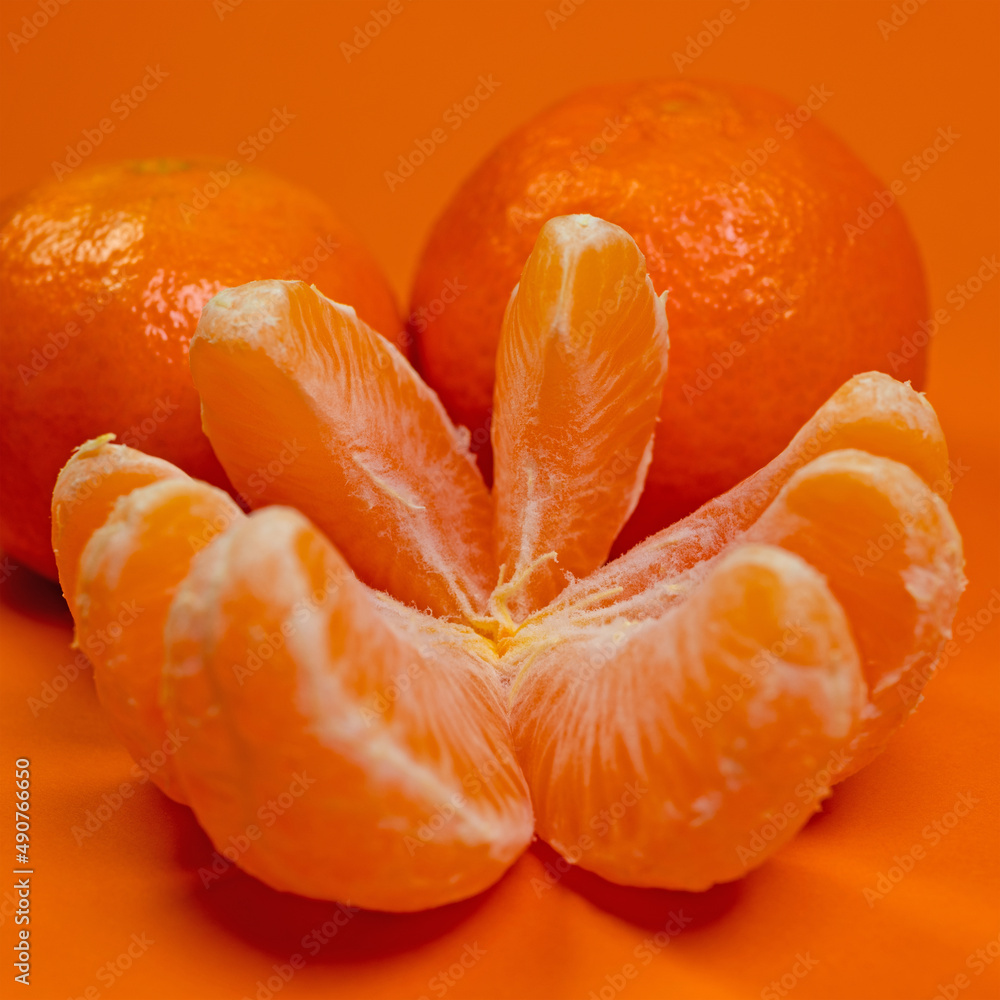 Mandarinensegmente in einer Nahaufnahme Mandarinensegmente in einer Nahaufnahme