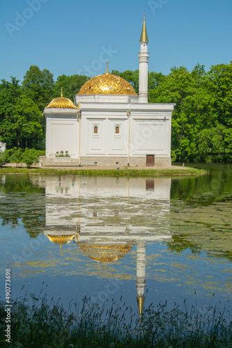 The 18th century mosque-like “Turkish Bath” pavilion built on the shore of Great Pond in Catherine Park on the orders of Emperor Nicholas I in Tsarskoye Selo, Russia photo