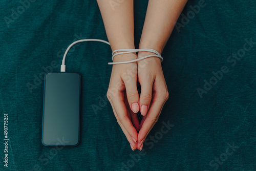 Woman's hands phone addiction concept. 