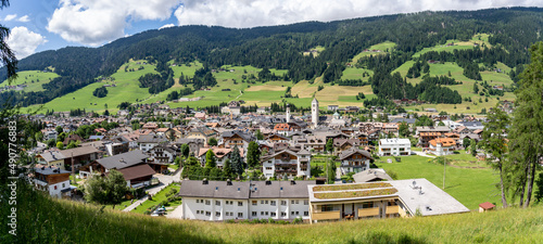 San Candido, Italy. View of the village from the hill. Tourist destination. It is a well-known summer tourist resort in the Dolomites photo