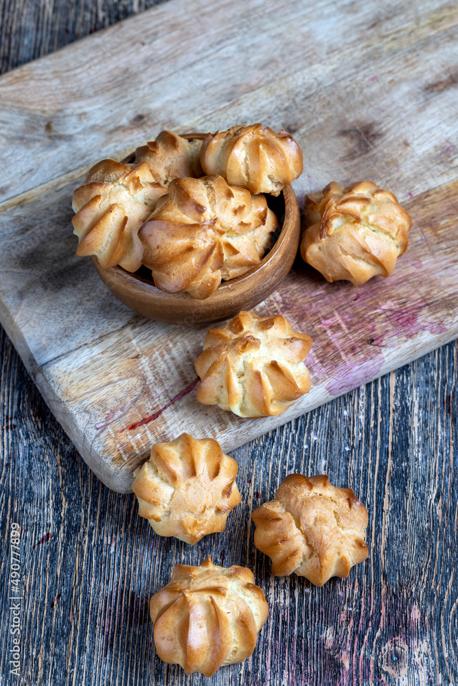 Fototapeta premium wheat pastry made of custard dough is baked with small cookies