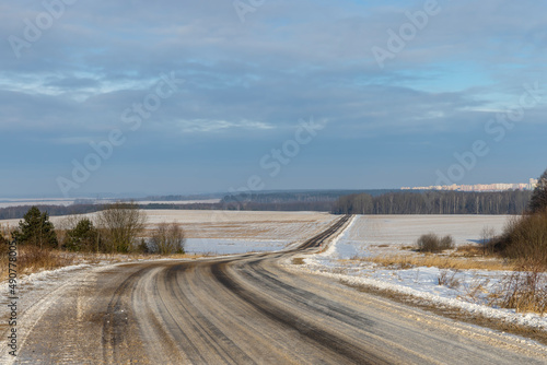 dangerous road in winter after snowfall 