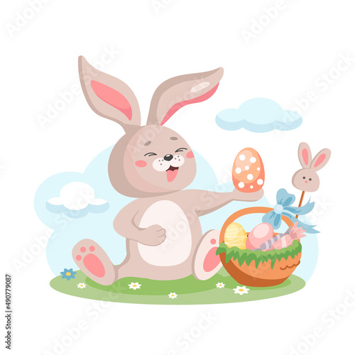 Cute Easter bunny and a basket with eggs  sweets. A hare is sitting on a green lawn. Easter. Vector illustration in cartoon style  isolated on a white background