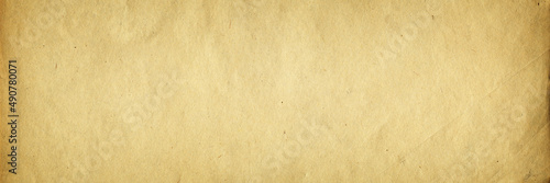 Old paper texture. Rough faded surface. Blank retro page. Empty place for text. Panoramic background for vintage style design.