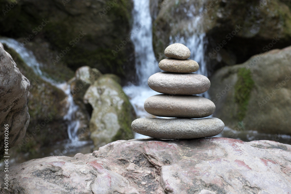 Zen stones, Against the background of a waterfall ... Zen stones, Against the background of a waterfall ...