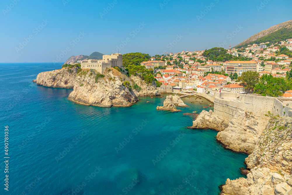 Aerial view on Dubrovnik city walls looking the Fort Lovrijenac fortress in West Harbour in Croatia. Dubrovnik UNESCO World Heritage Site is an old Venetian city of Croatia in Dalmatia