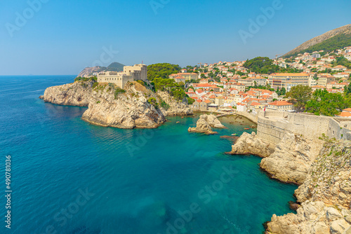 Aerial view on Dubrovnik city walls looking the Fort Lovrijenac fortress in West Harbour in Croatia. Dubrovnik UNESCO World Heritage Site is an old Venetian city of Croatia in Dalmatia
