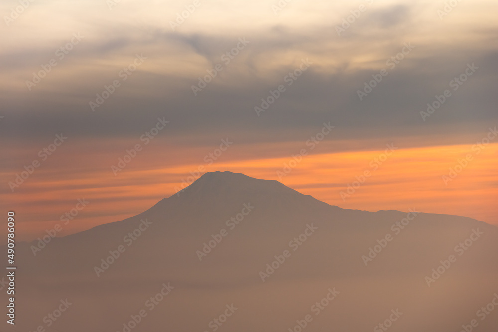 Sunset view with mountain top.
View of Mountain Ararat in sunset.