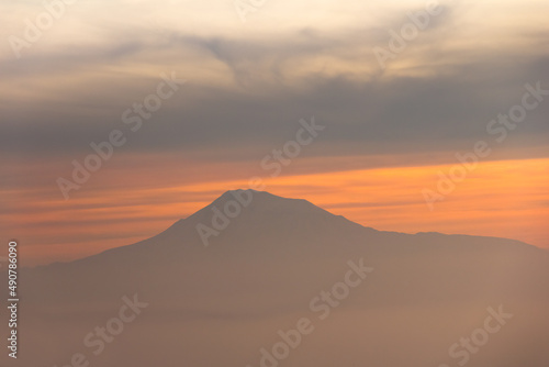 Sunset view with mountain top. View of Mountain Ararat in sunset.