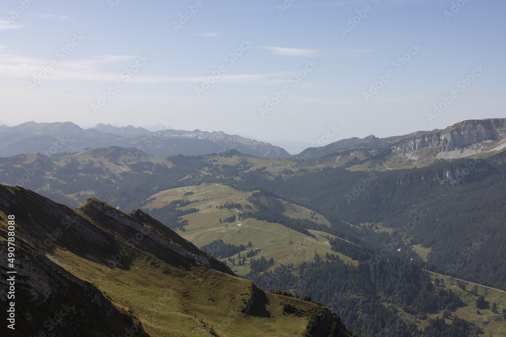 Naklejka premium Amazing hiking day in the alps of Switzerland. Wonderful view over a beautiful lake called Brienzersee. What an amazing view.