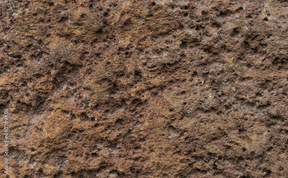 Backgound of unique rust coloured stone Backgound of unique rust coloured stone