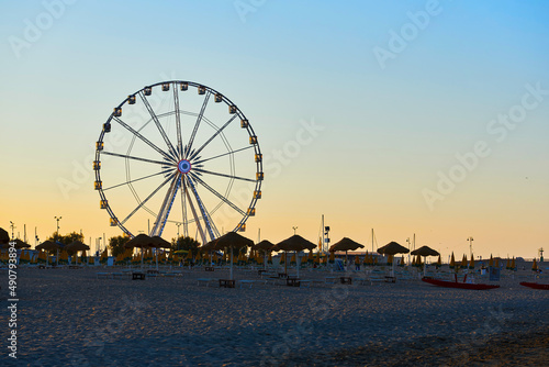 Rimini ferris wheel at sunset © Trambitski
