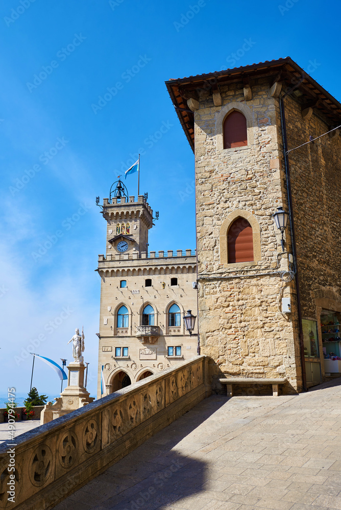 The Palazzo Pubblico and the statue of liberty in the historic center of San Marino on a sunny day