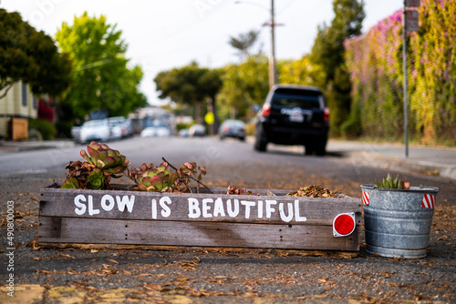 Slow is beautiful sign in Oakland streets