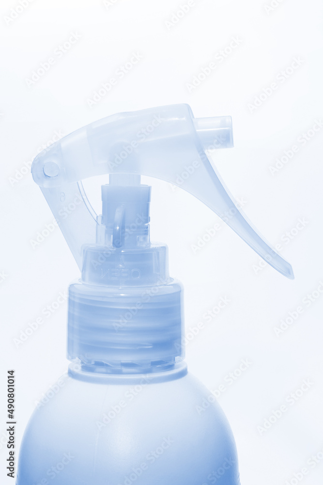 Blue spray bottle isolated on white background Blue spray bottle isolated on white background