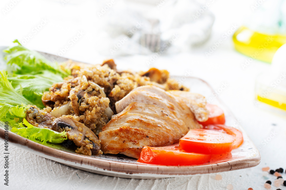 Chicken breast with fried mushrooms on plate Chicken breast with fried mushrooms on plate