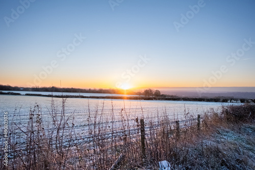 Beautiful view of a frozen landscape on a cold winter morning photo