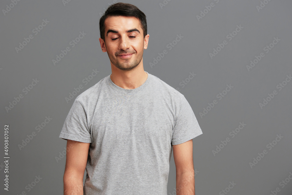 Fototapeta premium Cheerful man posing lifestyle smile studio isolated background