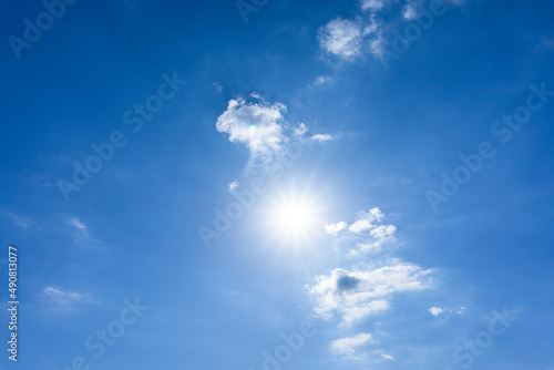 Background material of sun flare and refreshing blue sky and clouds_wide_09