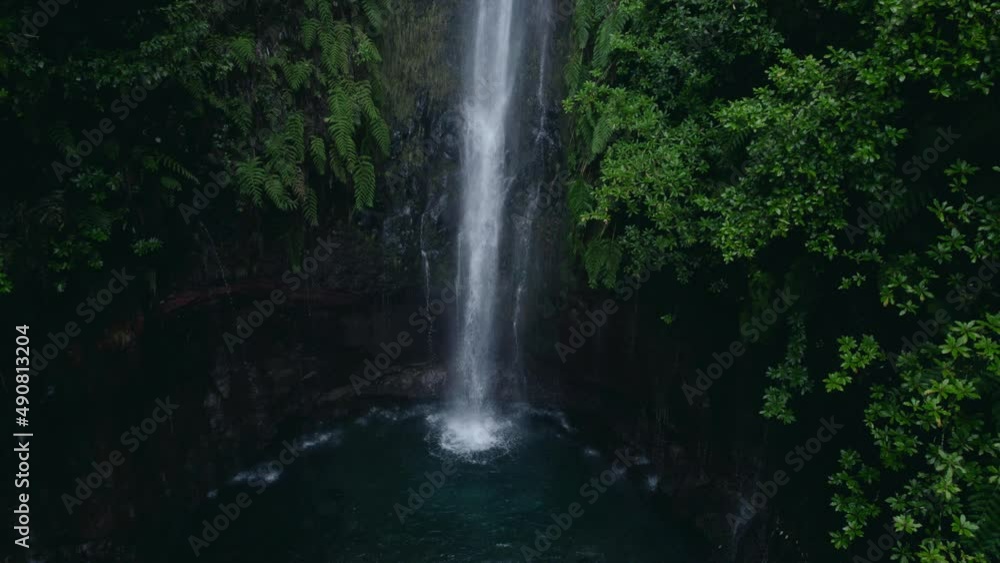 Beautiful waterfall in green forest, top view. Tropical in mountain jungle. Waterfall in the tropical forest. Big Small in 4k 30 FPS Beautiful waterfall in green forest, top view. Tropical in mountain jungle. Waterfall in the tropical forest. Big Small in 4k 30 FPS