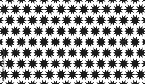 Seamless pattern. Repeated black and white star motif. Simple pattern design