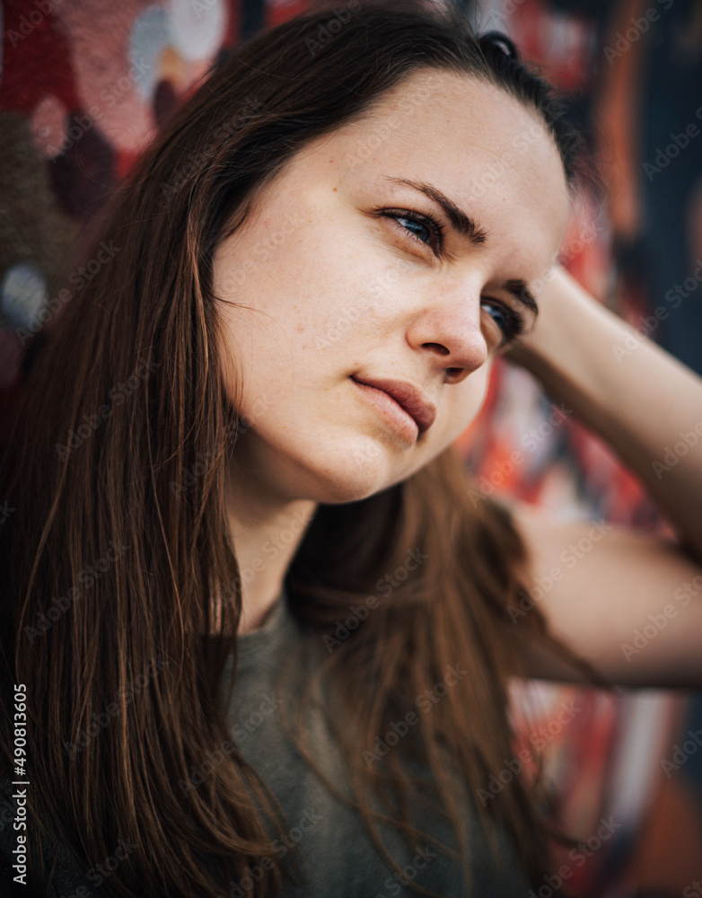 Beuatiful female street fashion model poses for the camera in the colorful streets of Miami Beuatiful female street fashion model poses for the camera in the colorful streets of Miami