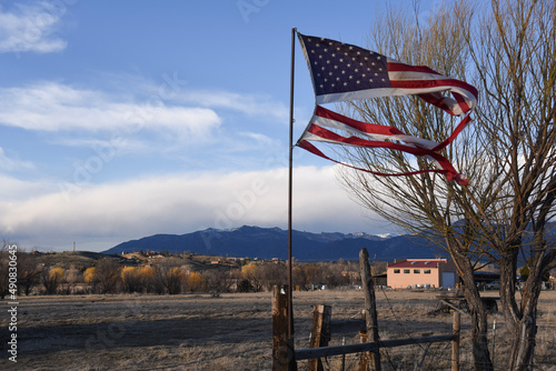 american flag in the wind photo