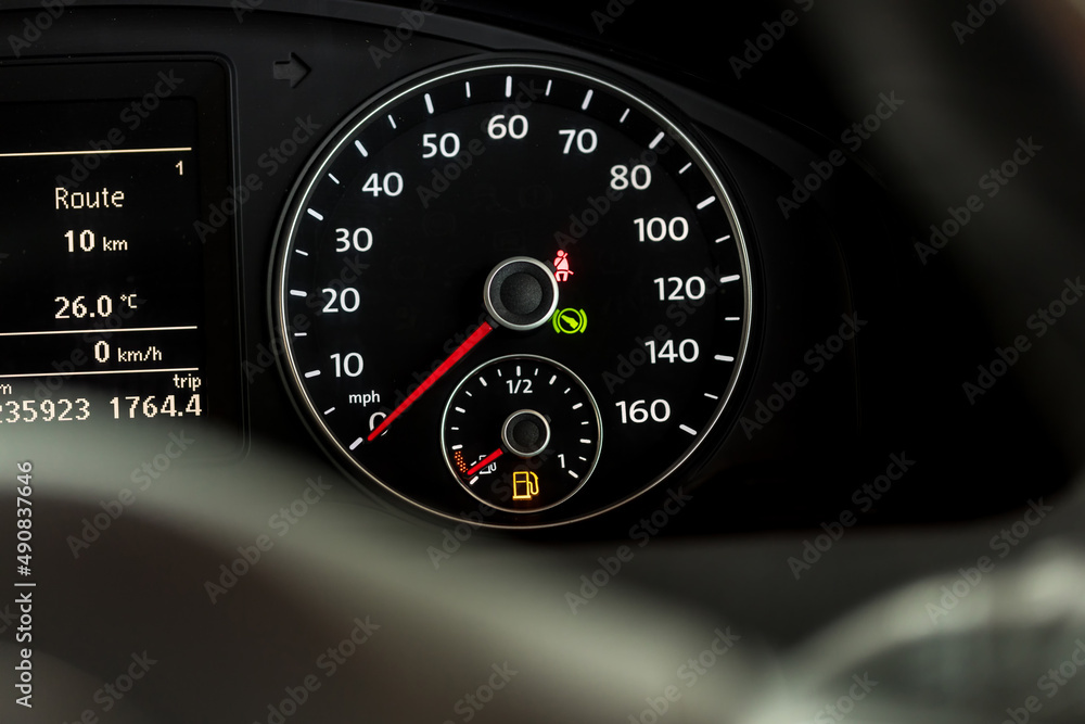 Empty fuel warning light in car dashboard. Fuel pump icon. gasoline gauge dash board in car with digital warning sign of run out of fuel turn on. Low level of fuel show on speedometer dashboard.	