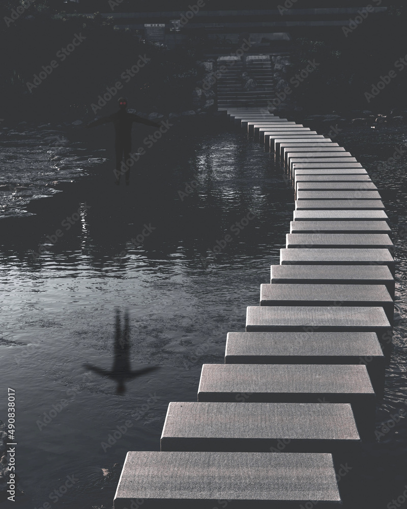Obraz premium Hovering man in the air over a lake