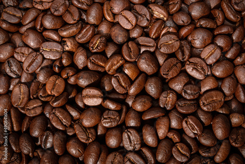 coffee beans, freshly roasted grain an image for coffee business or as background © chaophrayaart