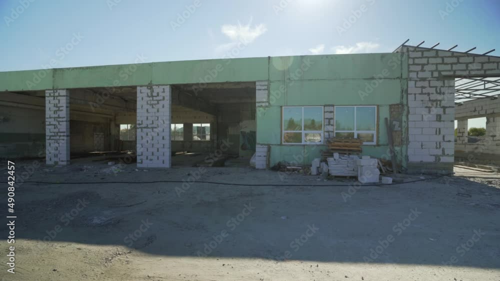Building in Process of Construction. Unfinished building on a plant Building in Process of Construction. Unfinished building on a plant