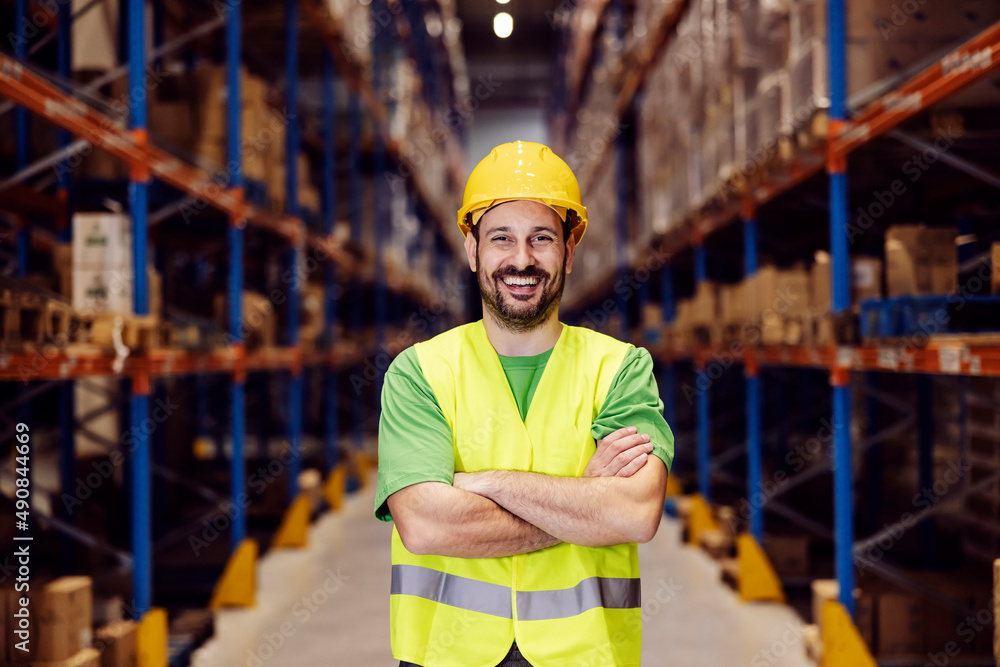 Portrait of a proud storage worker smiling at the camera. Portrait of a proud storage worker smiling at the camera.